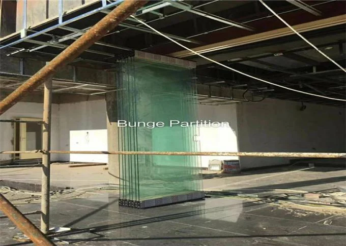 Pakistan Exhibition Show Room Folding Glass Partition Wall Under A Steel Beam Install 2