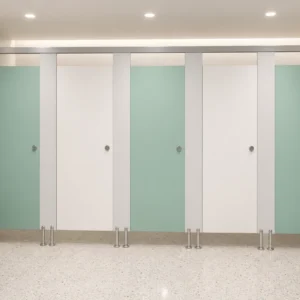 Seafoam compact laminate toilet partitions in a hospital washroom