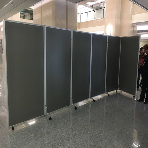 What are the functional uses for the folding screens/partitions?