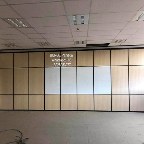 What is the difference between a movable partition and a solid wall?